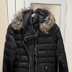 The North Face Girl’s Black Puffer Coat with Faux Fur Trim